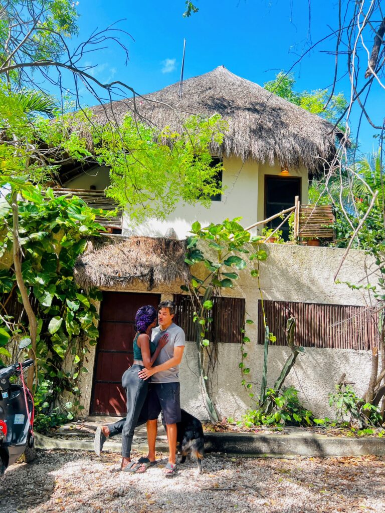 Monthly Cost Of Living In Tulum Couple In Front Of Home